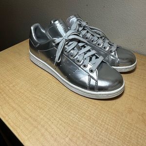 Silver metallic Stan smith sneakers.